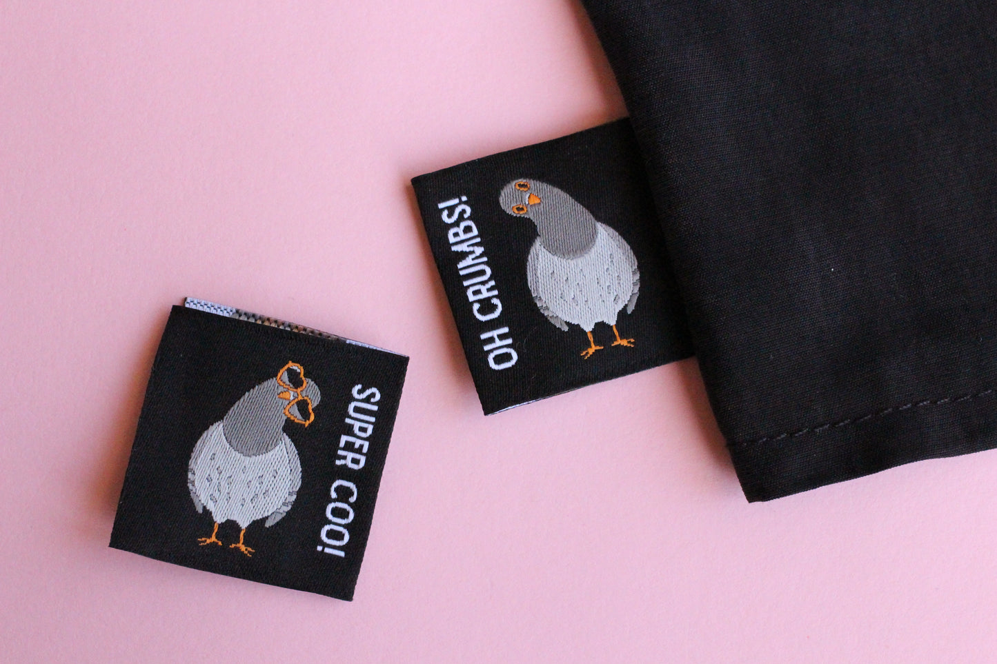 Double-sided Pigeon sewing labels by The Cosy Club Handmade, featuring six colorful, durable fabric tags for clothing and craft projects.