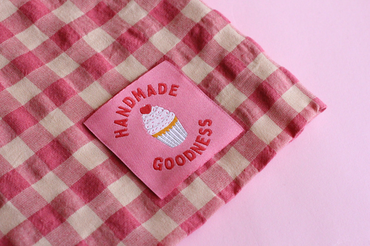 Handmade Goodness 5 Cupcake Sewing Labels by The Cosy Club Handmade, featuring colorful cupcake designs on fabric labels.
