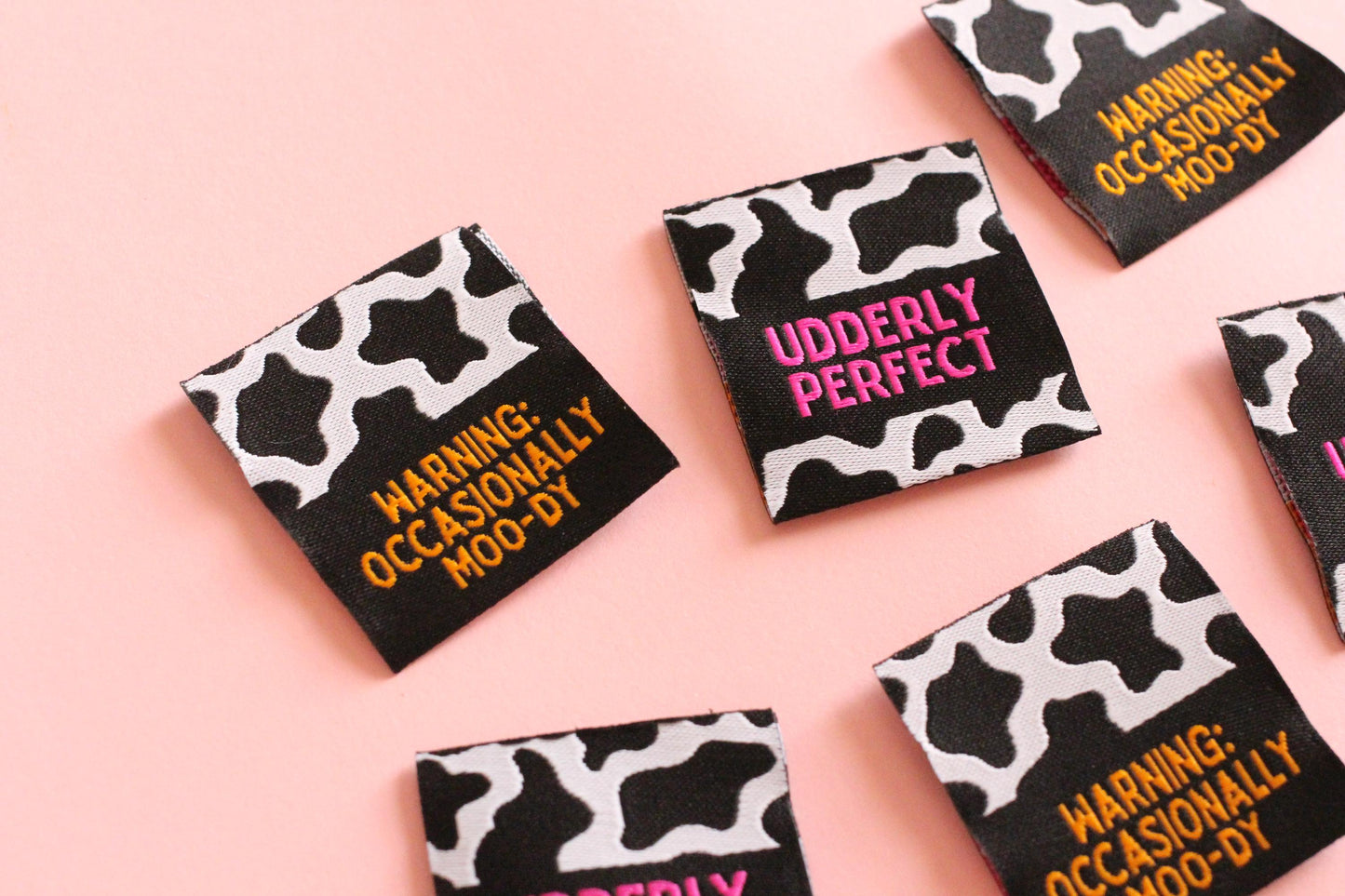 UDDERLY PERFECT / OCCASIONALLY MOO-DY | Cow Print Double Sided Woven Sewing Labels (6 Pack) - The Cosy Club Handmade