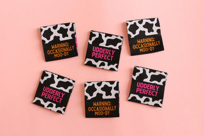 UDDERLY PERFECT / OCCASIONALLY MOO-DY | Cow Print Double Sided Woven Sewing Labels (6 Pack) - The Cosy Club Handmade