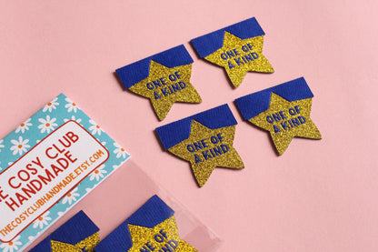 Star Sewing Labels: Metallic Gold "One of a Kind" Woven Tags (Pack of 4), Interfaced | Woven Sewing Labels for Handmade Gifts and Projects - The Cosy Club Handmade