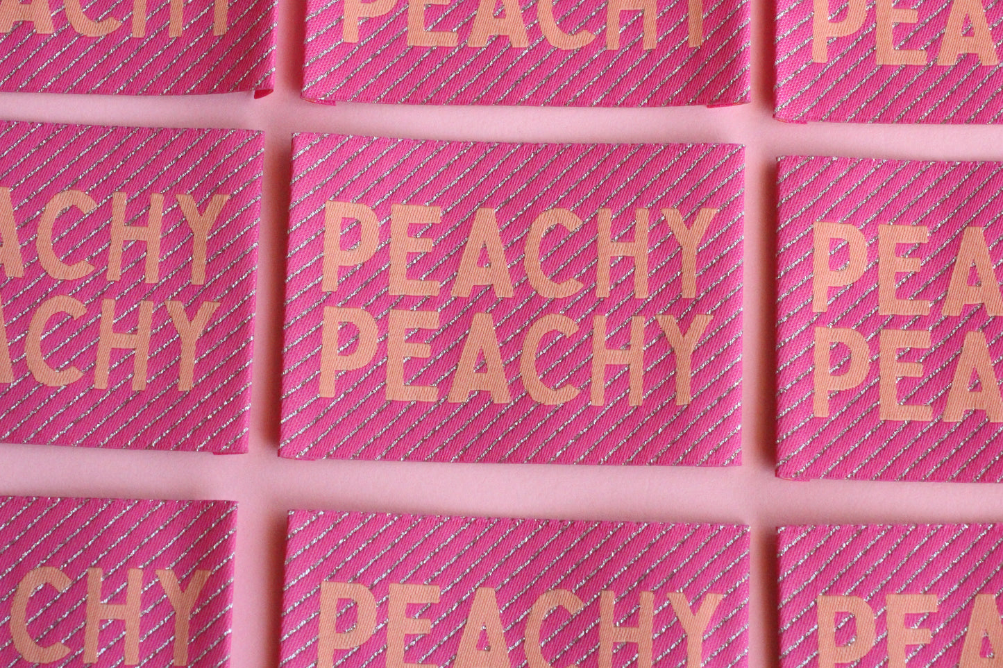 Large Peachy Peach sewing labels from The Cosy Club Handmade, woven fabric labels for clothing or craft projects.