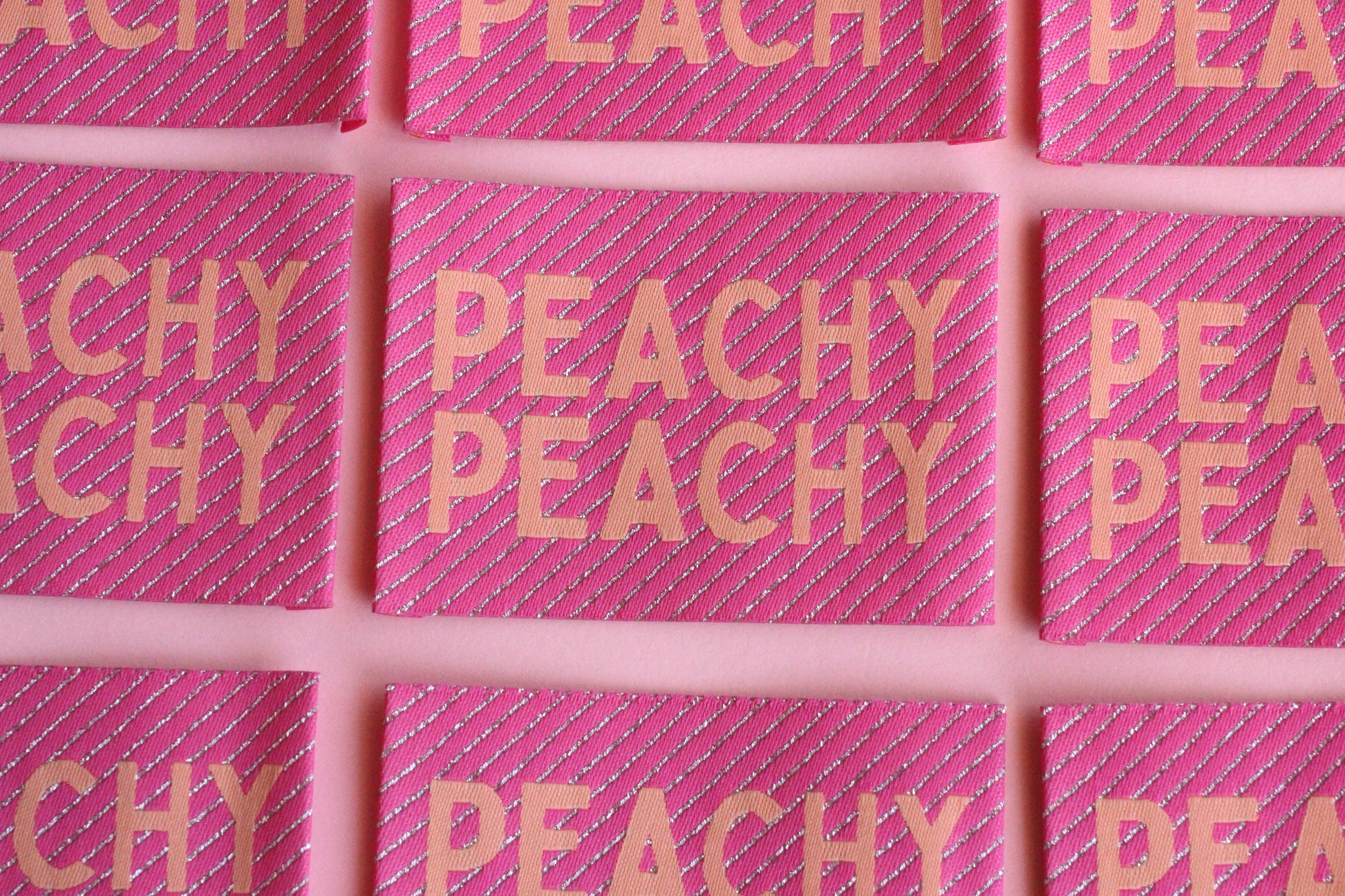 Large Peachy Peach sewing labels from The Cosy Club Handmade, woven fabric labels for clothing or craft projects.