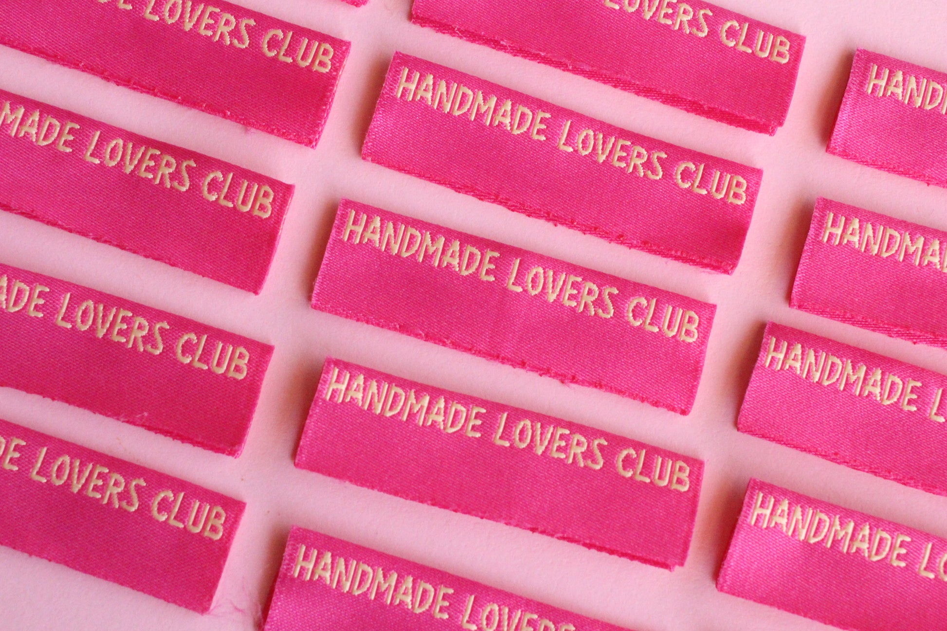 Handmade Lovers Club sewing labels by The Cosy Club Handmade, 6 side seam labels with decorative designs for clothing or craft projects.
