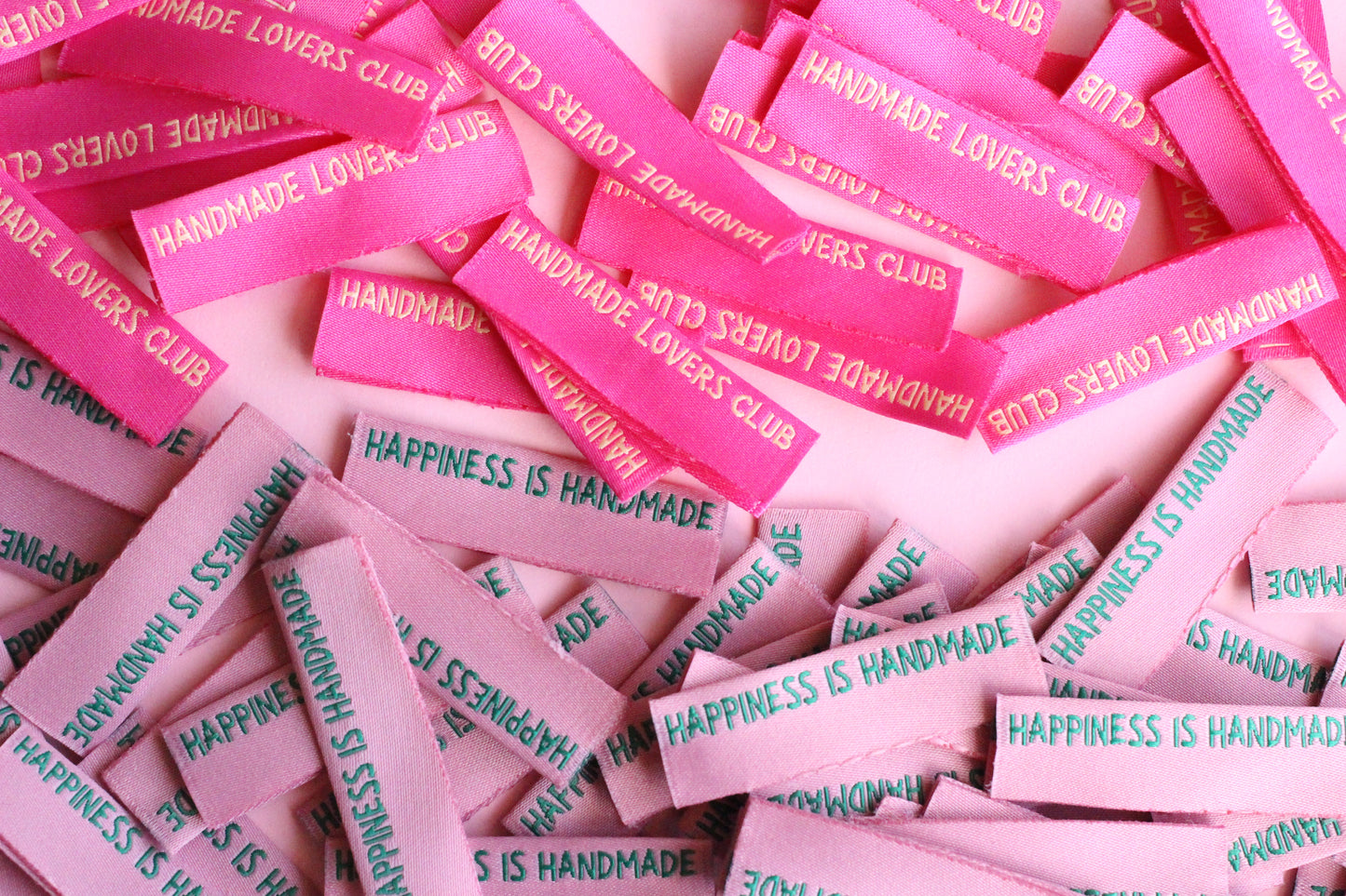 Handmade sewing labels with "Happiness is Handmade" text, six side seam labels from The Cosy Club Handmade.