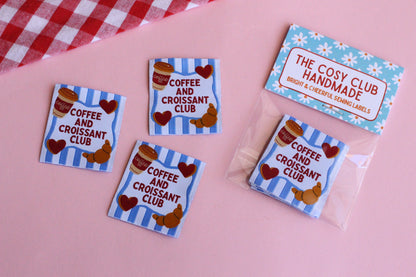 Set of five sewing labels featuring coffee and croissant designs from The Cosy Club Handmade for craft and sewing projects.