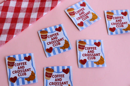 Set of five sewing labels featuring coffee and croissant designs from The Cosy Club Handmade, perfect for craft projects and clothing.