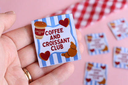 Set of five sewing labels from The Cosy Club Handmade featuring coffee and croissant designs for craft or clothing projects.