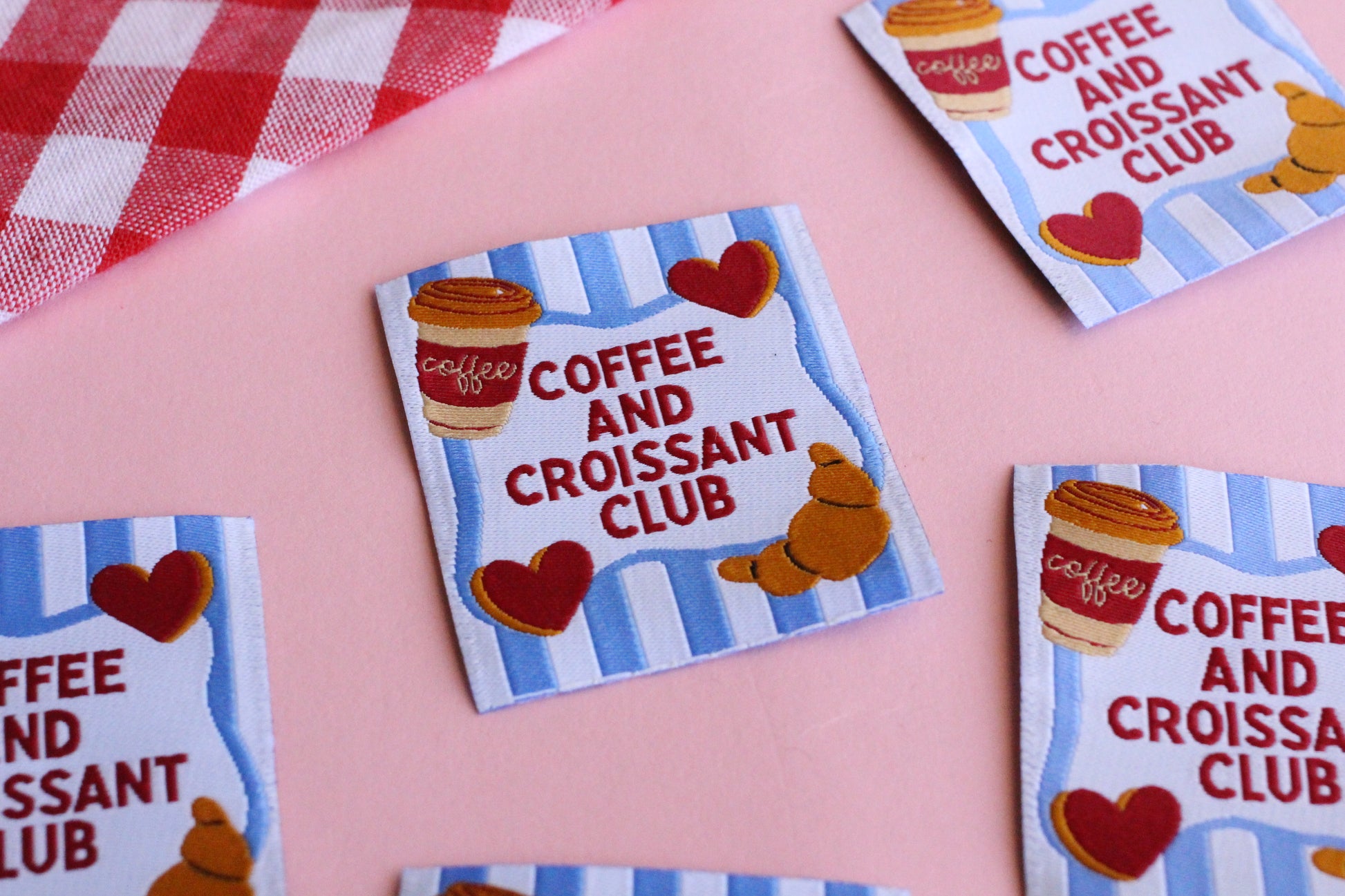 Set of five sewing labels featuring Coffee and Croissant Club design by The Cosy Club Handmade, perfect for sewing projects.