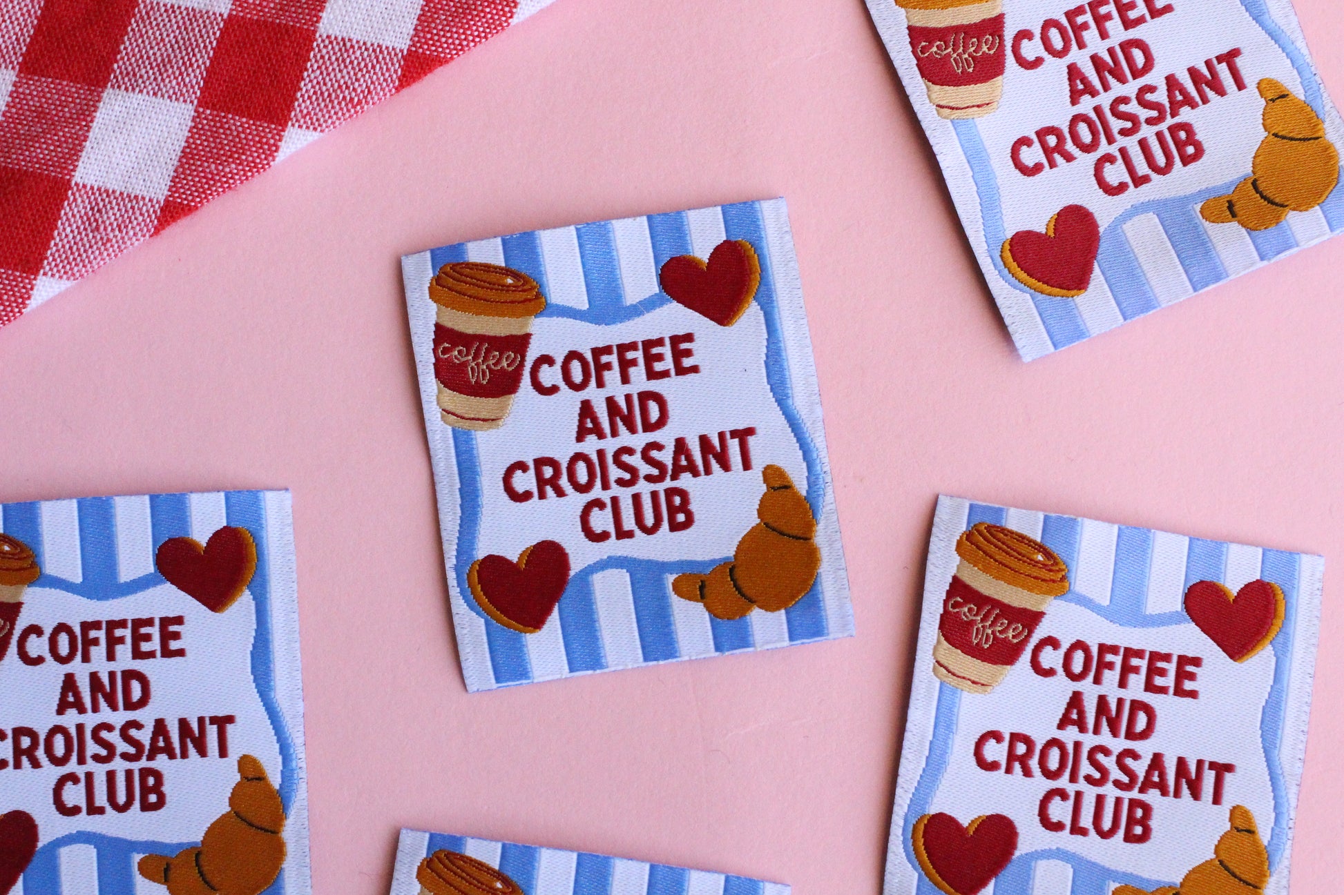 Set of five sewing labels from The Cosy Club Handmade featuring coffee and croissant designs for crafting and sewing projects.