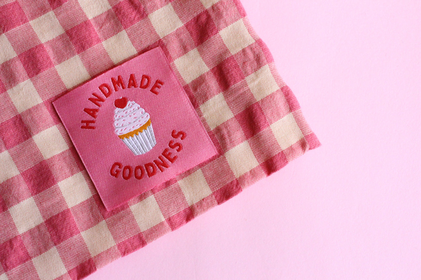 Handmade Goodness 5 cupcake sewing labels by The Cosy Club Handmade, featuring colorful cupcake designs on fabric labels.