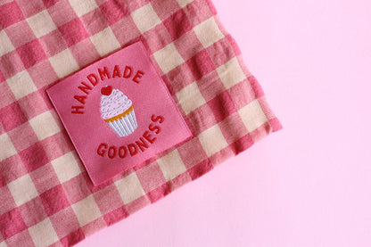 Handmade Goodness 5 cupcake sewing labels by The Cosy Club Handmade, featuring colorful cupcake designs on fabric labels.