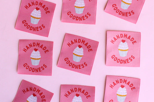 Handmade Goodness cupcake sewing labels by The Cosy Club Handmade, featuring five colorful fabric labels with cupcake design.
