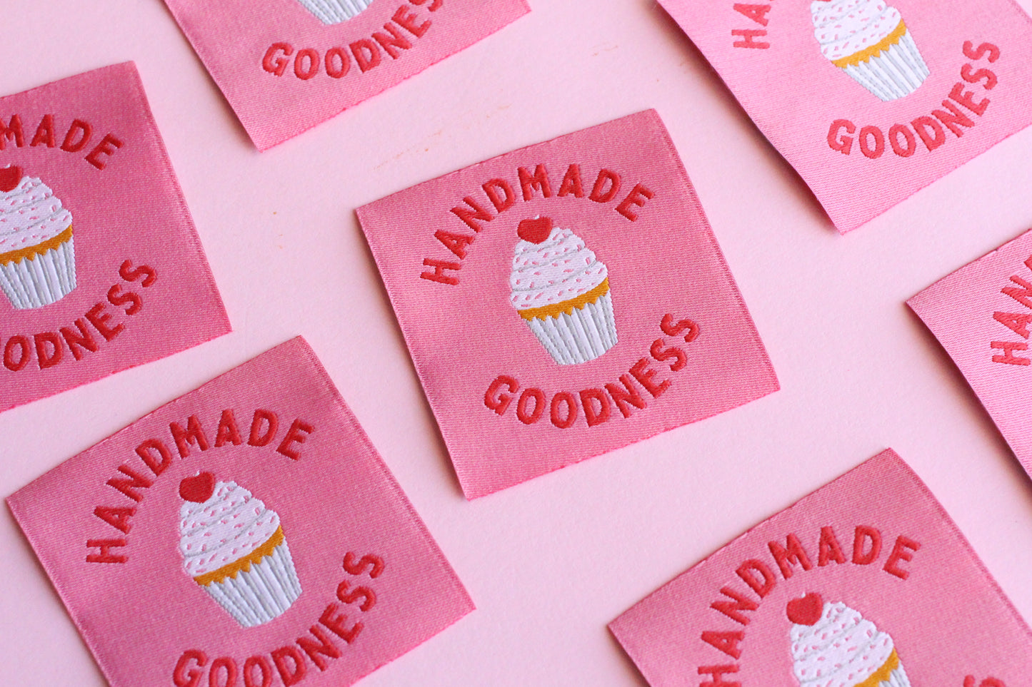 Handmade 5 cupcake sewing labels by The Cosy Club Handmade, featuring colorful, embroidered cupcake designs for craft projects.