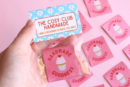 Handmade Goodness cupcake-shaped sewing labels from The Cosy Club Handmade, featuring five colorful embroidered labels on a plain background.
