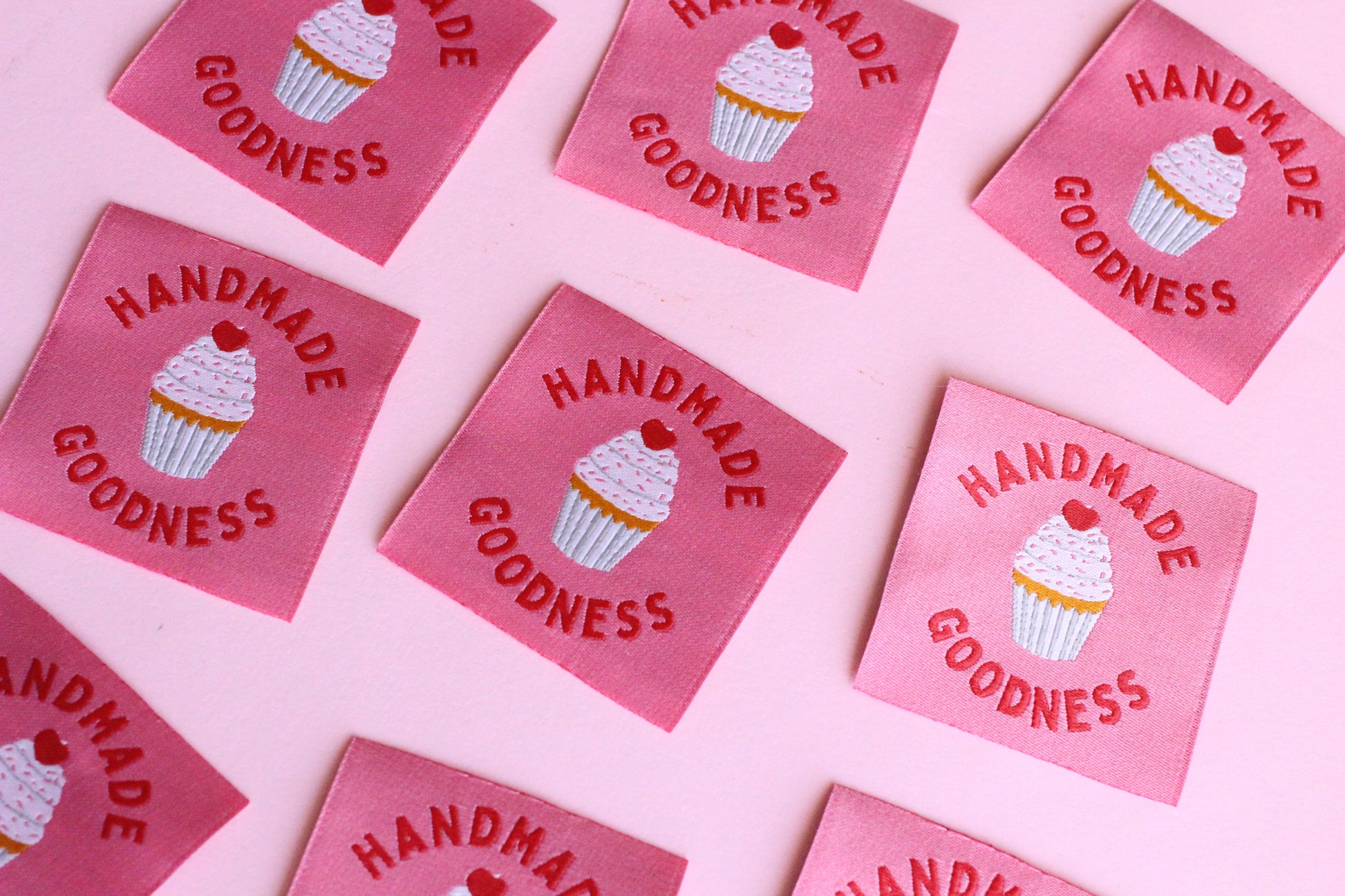 Handmade 5 cupcake sewing labels by The Cosy Club Handmade, featuring colorful cupcake designs on fabric labels for crafts.