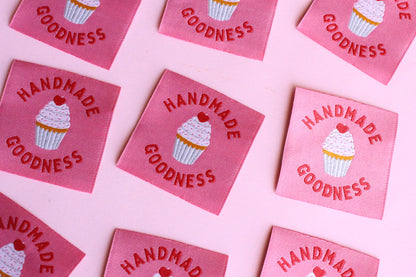 Five handmade cupcake sewing labels from The Cosy Club Handmade, featuring colorful cupcake designs on white fabric.