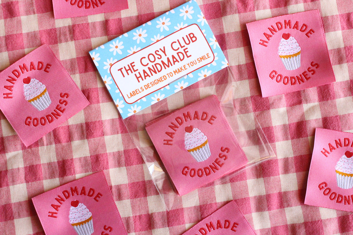 Handmade Goodness 5 cupcake-shaped sewing labels by The Cosy Club Handmade, featuring colorful embroidered cupcake designs.