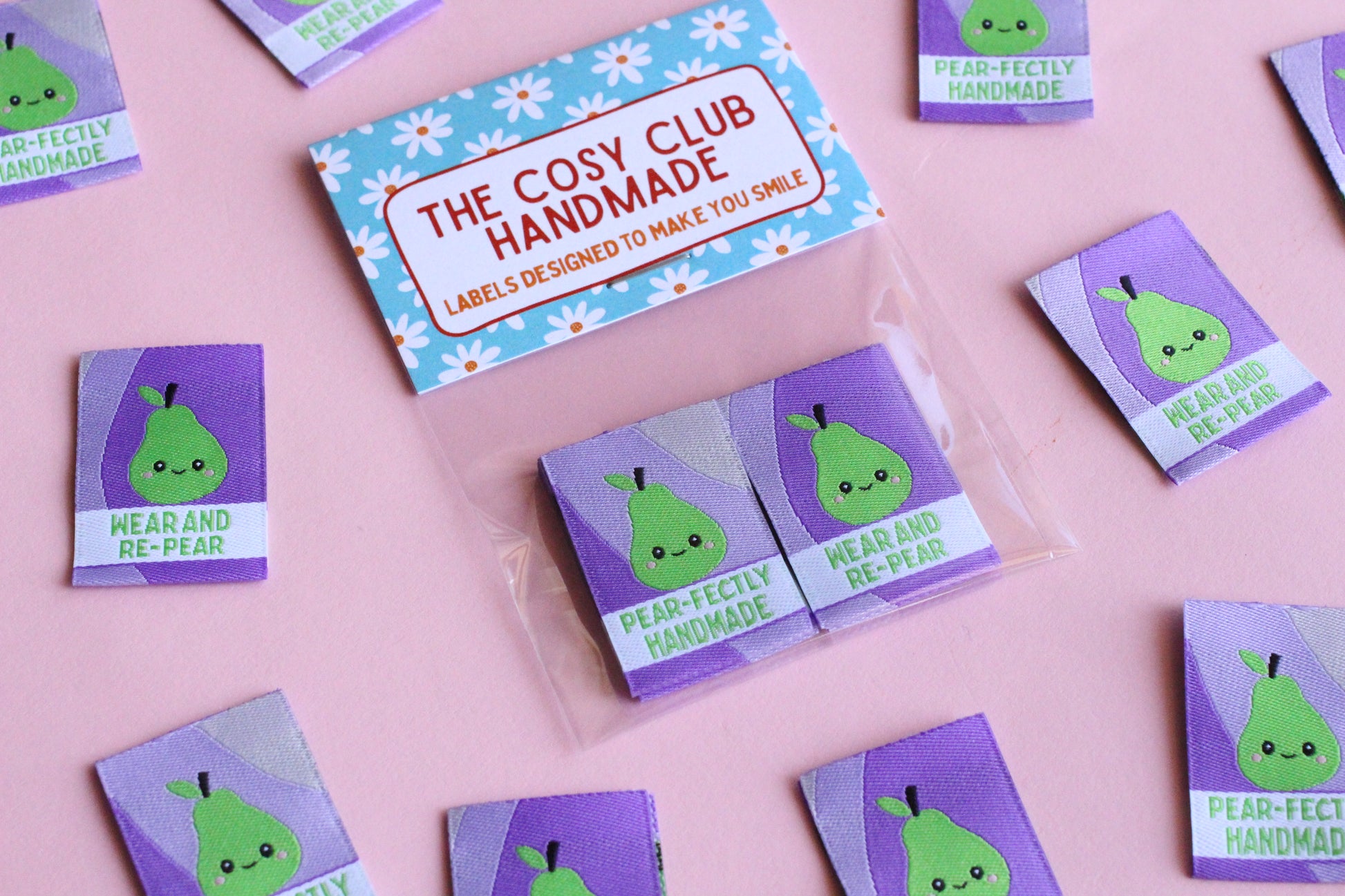Six double-sided woven labels from PEAR-fectly Handmade by The Cosy Club Handmade, featuring intricate woven patterns and natural fibers.