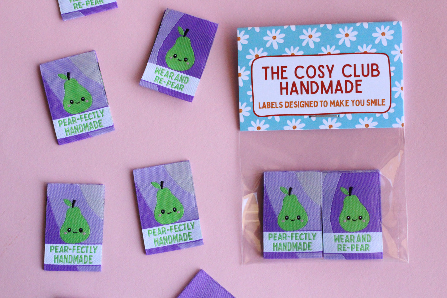 Six double-sided woven labels with "PEAR-fectly Handmade" design from The Cosy Club Handmade, showing detailed embroidery and texture.