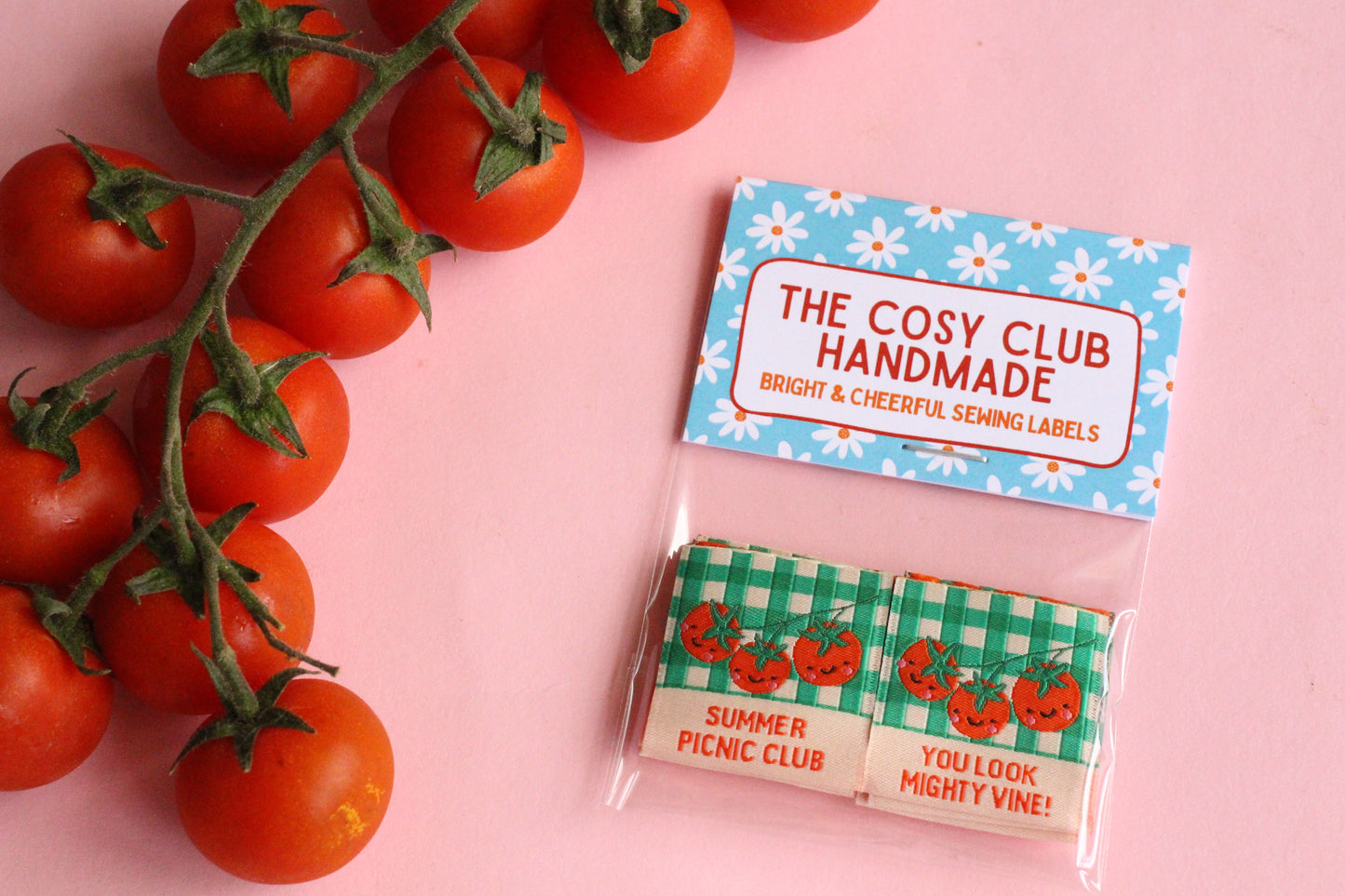 Six double-sided tomato sewing labels from The Cosy Club Handmade Summer Picnic Club collection displayed on a neutral background.
