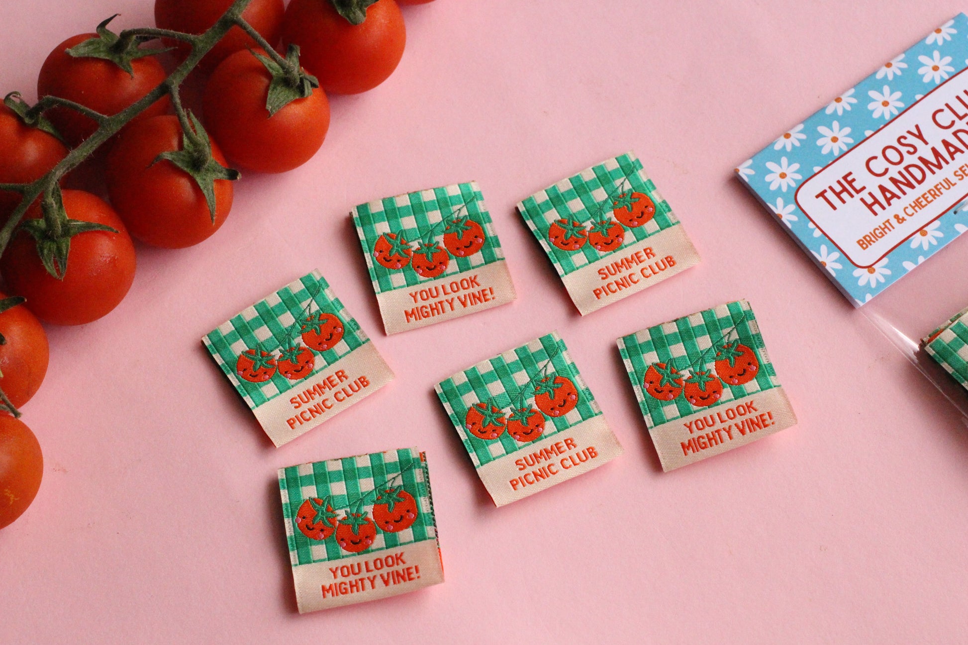 Six double-sided tomato sewing labels from The Cosy Club Handmade Summer Picnic Club collection, featuring vibrant, sewn-on fabric tags.