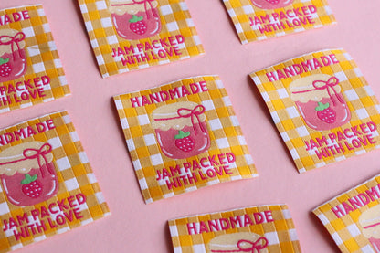 Handmade jam-themed sewing labels from The Cosy Club Handmade, featuring colorful "Packed With Love" designs for craft projects.