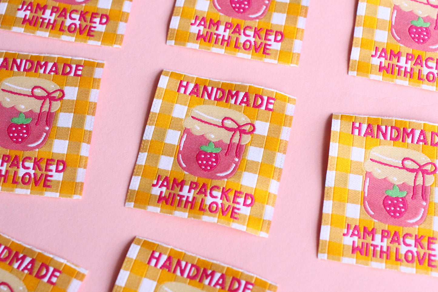 Handmade Jam Packed With Love sewing labels by The Cosy Club Handmade, featuring five charming homemade jam-themed fabric labels.