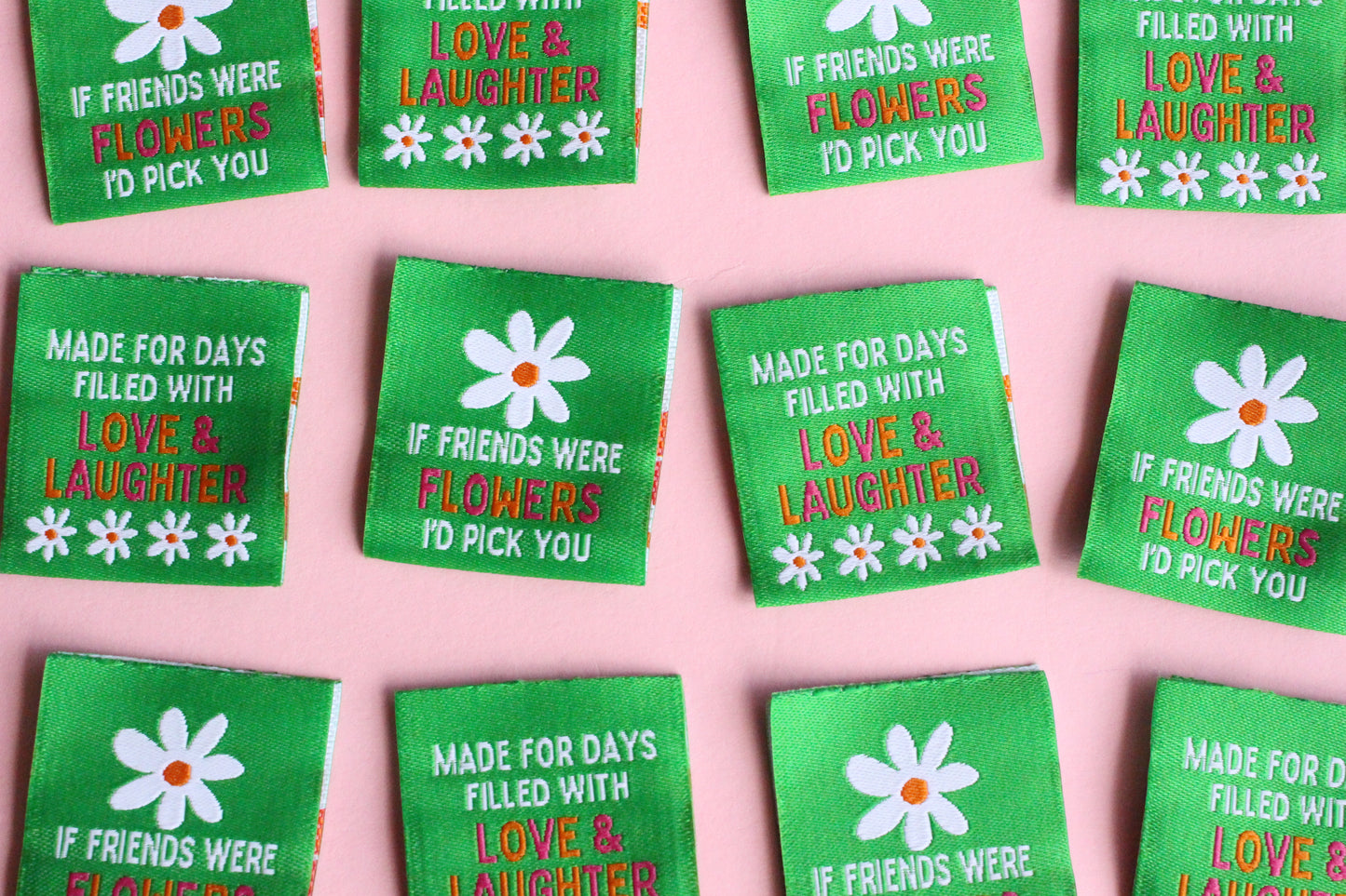 Six double-sided woven labels with "If Friends Were Flowers, I'd Pick You" text by The Cosy Club Handmade, featuring floral and label designs.