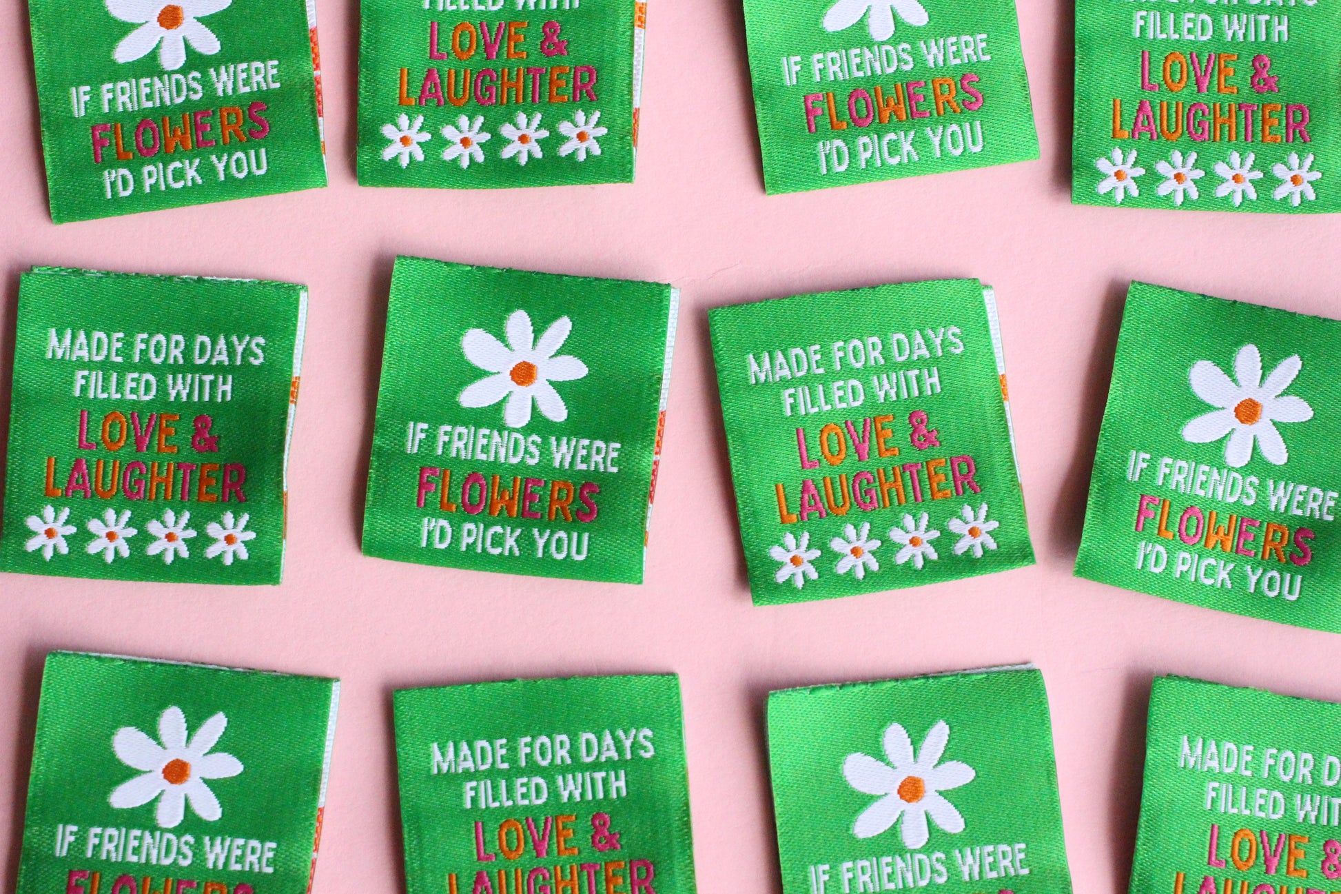 Six double-sided woven labels with "If Friends Were Flowers, I'd Pick You" text by The Cosy Club Handmade, featuring floral and label designs.