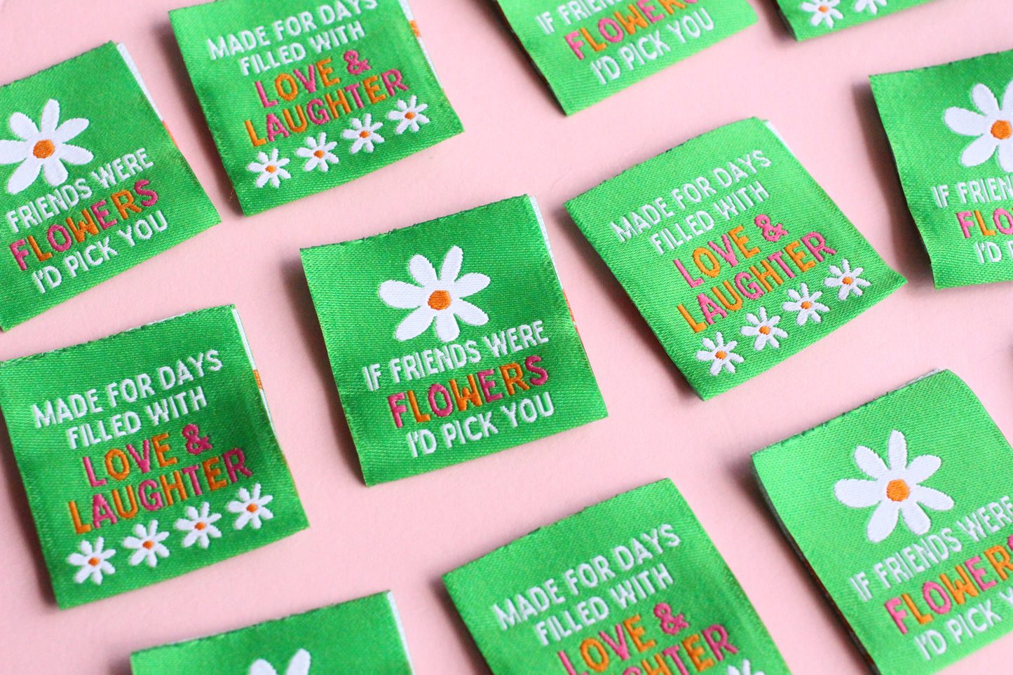 Double-sided woven label with "If Friends Were Flowers, I'd Pick You" message, by The Cosy Club Handmade, featuring floral design.