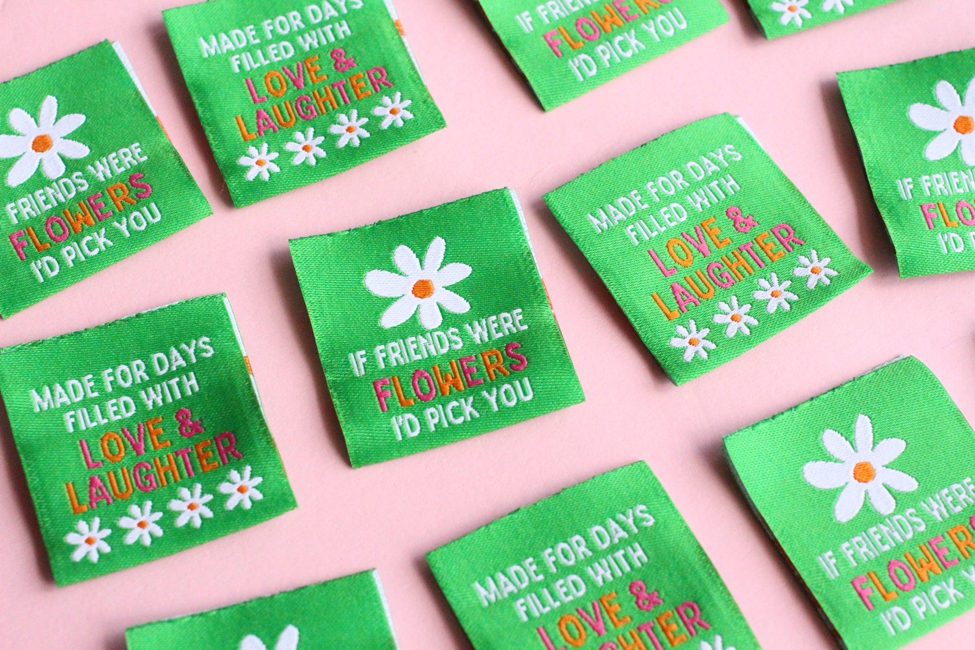 Double-sided woven label with "If Friends Were Flowers, I'd Pick You" message, by The Cosy Club Handmade, featuring floral design.