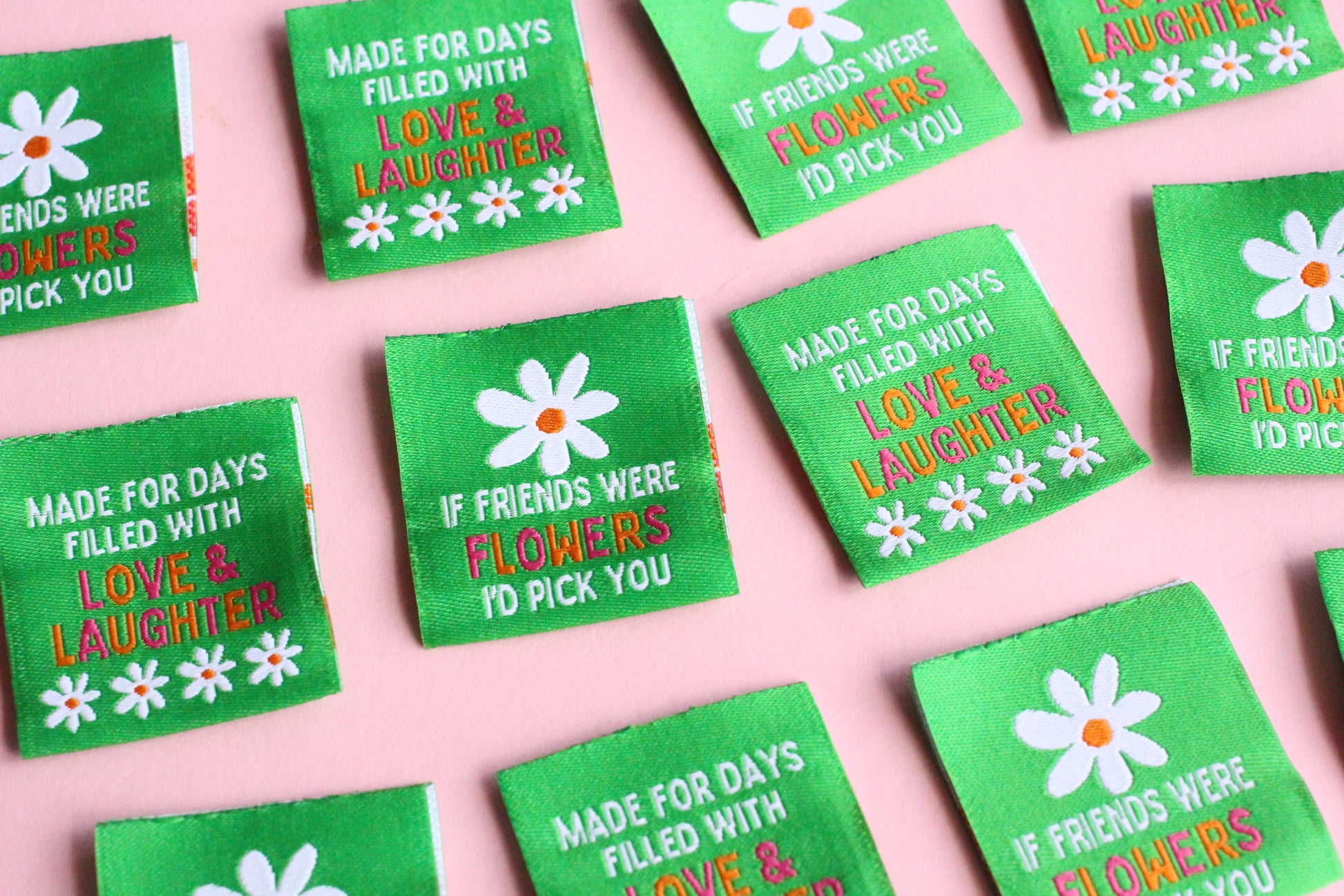 Double-sided woven label with "If Friends Were Flowers, I'd Pick You" by The Cosy Club Handmade, featuring colorful floral design.