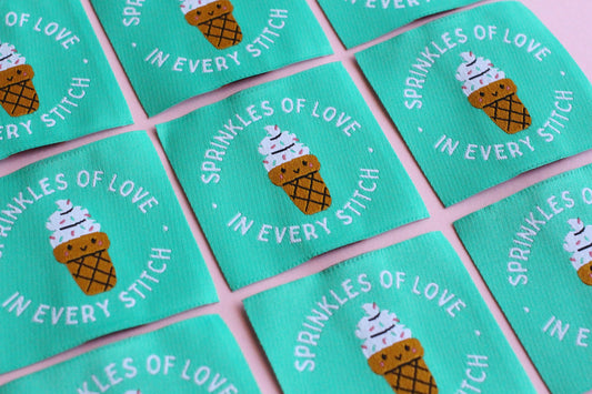 Set of five ice cream-themed sewing labels from The Cosy Club Handmade with colorful sprinkles design for craft projects.
