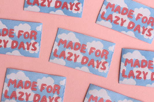Sky blue sewing labels from Made for Lazy Days by The Cosy Club Handmade, featuring five fabric labels for sewing projects.