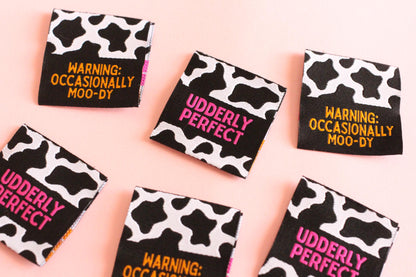 UDDERLY PERFECT / OCCASIONALLY MOO-DY | Cow Print Double Sided Woven Sewing Labels (6 Pack) - The Cosy Club Handmade